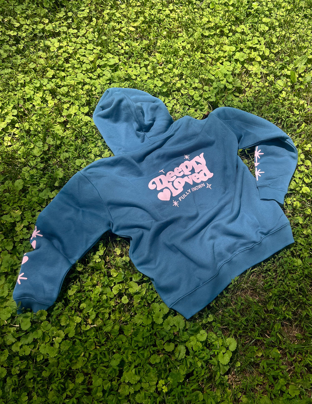 Unisex Deeply Loved Hoodie by Elevated Faith, showing a cozy, stylish hoodie with a faith-inspired design in soft fabric.