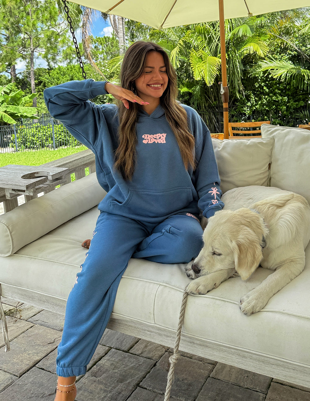 Unisex hoodie by Elevated Faith featuring a "Deeply Loved" design, soft fabric, and comfortable fit in a casual style.