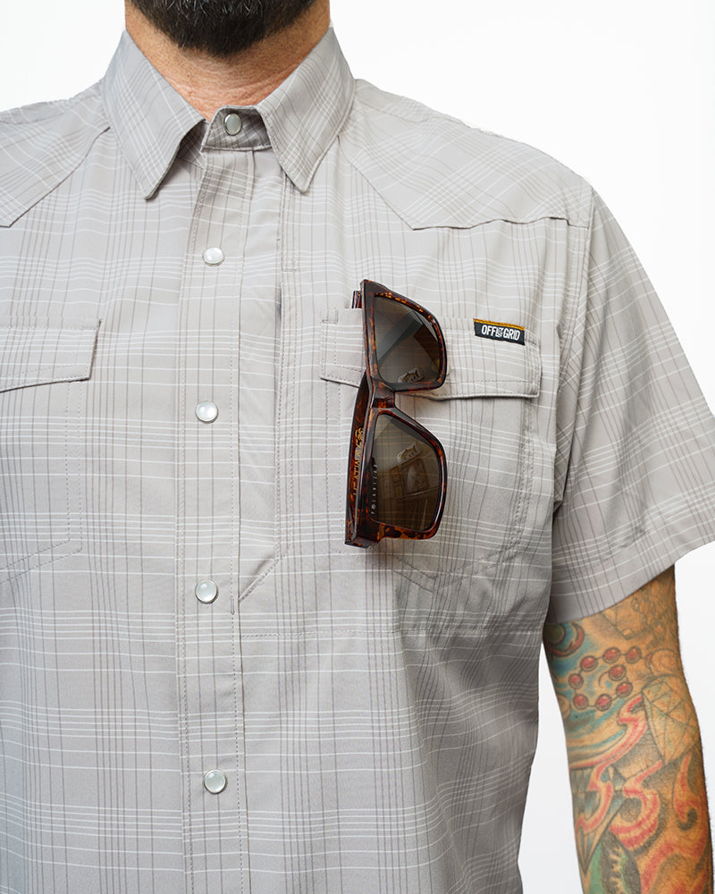 Storm grey Deke SS short sleeve shirt by Off The Grid Surplus, shown flat with collar and button details.