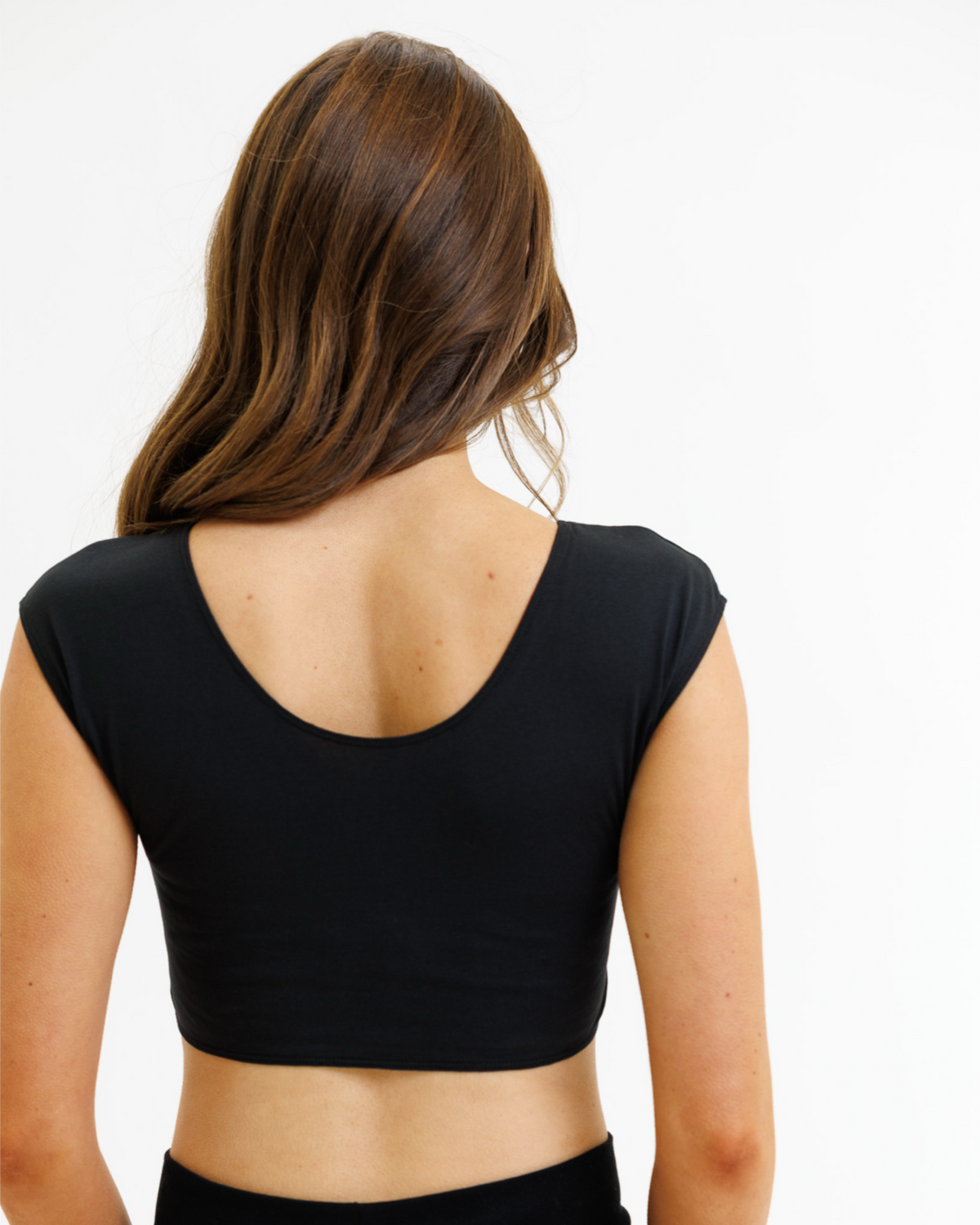Light gray Downeast Demi Tee with a relaxed fit, shown on a hanger, highlighting its soft fabric and casual style.
