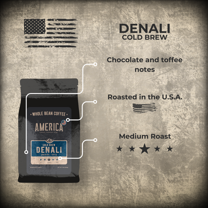 Cold brew coffee from America Supply Company LLC, Denali brand, displayed in a clear glass mug with ice and coffee beans.