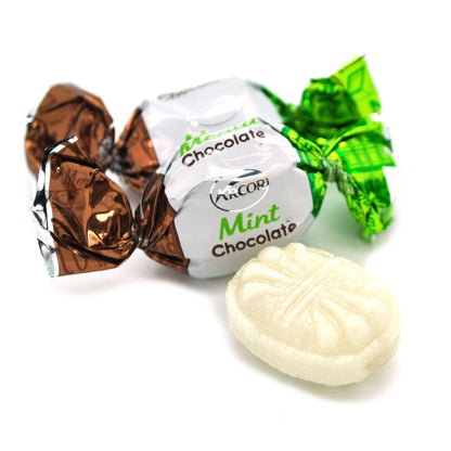 Assorted Arcor Chocolate Filled Mints hard candies in a bulk Candy In Bulk package, featuring colorful packaging and mint candies inside.