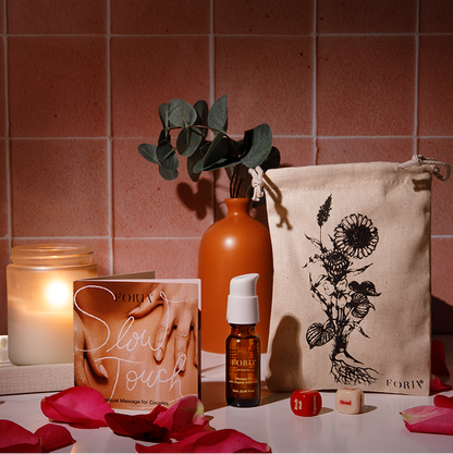 Foria Desire Dice Kit with colorful, numbered dice designed for enhancing intimacy and pleasure experiences.