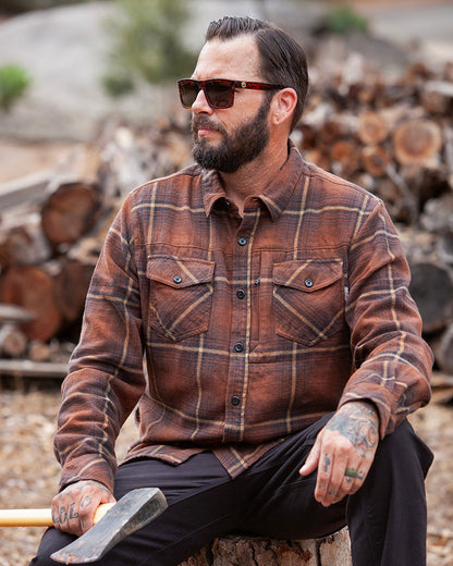Burnt brown Destroyer Flannel by Off The Grid Surplus shown in a close-up, highlighting soft fabric and classic plaid pattern.