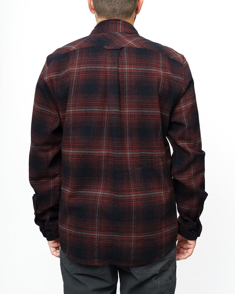 Black Destroyer Flannel by Off The Grid Surplus, showing a cozy, stylish flannel shirt with a button-up front and classic plaid pattern.