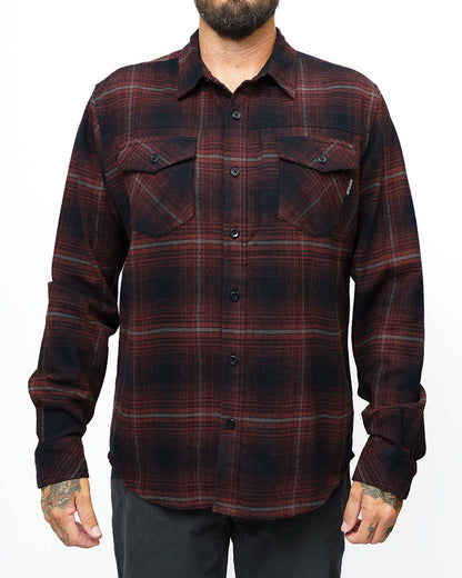 Black Destroyer Flannel by Off The Grid Surplus, showcasing a cozy, stylish black flannel shirt with button closure and classic fit.