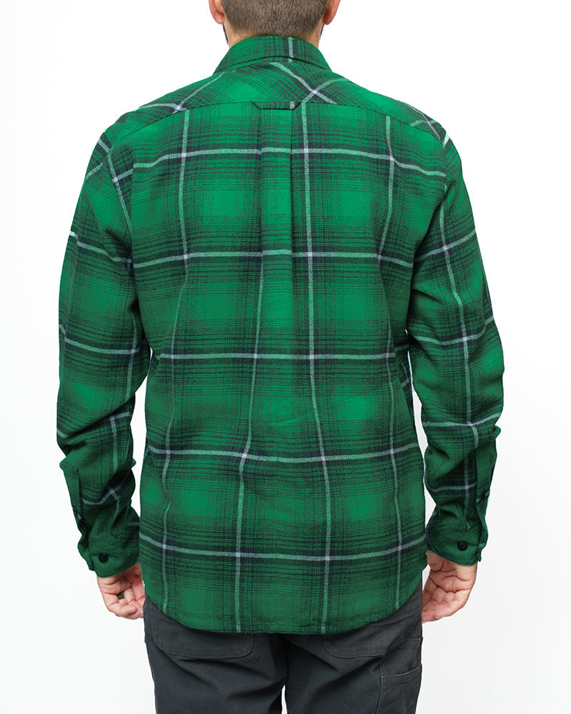 Off The Grid Surplus Destroyer Flannel in Fairway color, showcasing a cozy plaid flannel shirt with button-up front and collar.