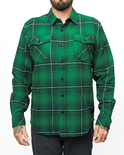 Off The Grid Surplus Destroyer Flannel in Fairway color, showing a close-up of the soft, plaid fabric with button details.