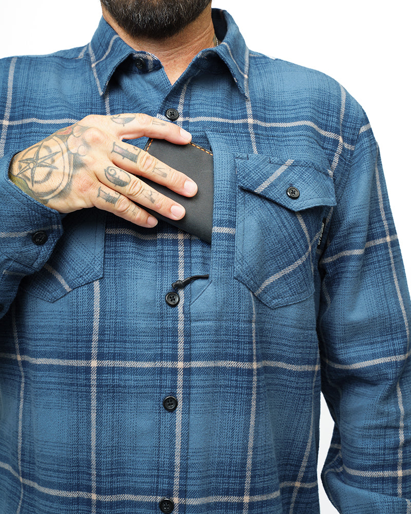 Pale blue Destroyer Flannel shirt by Off The Grid Surplus, shown laid flat with button details and soft fabric texture.