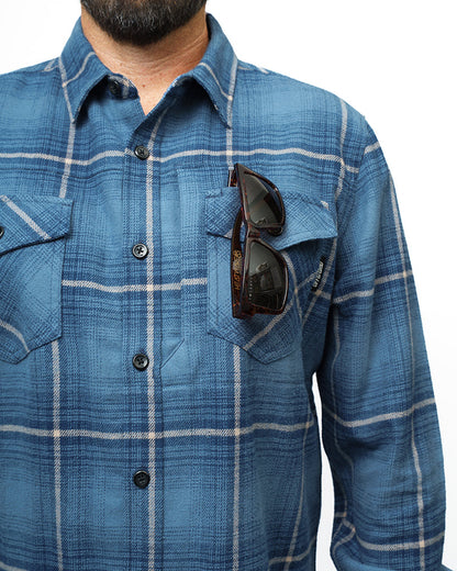 Pale blue Destroyer Flannel shirt from Off The Grid Surplus, showing soft fabric and classic plaid pattern.