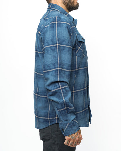 Pale blue Destroyer Flannel shirt by Off The Grid Surplus, showing soft fabric and classic plaid pattern.