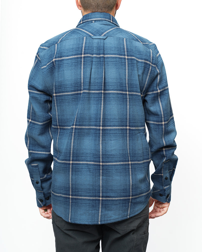 Pale blue Off The Grid Surplus Destroyer Flannel shirt with button-up front and classic plaid pattern.