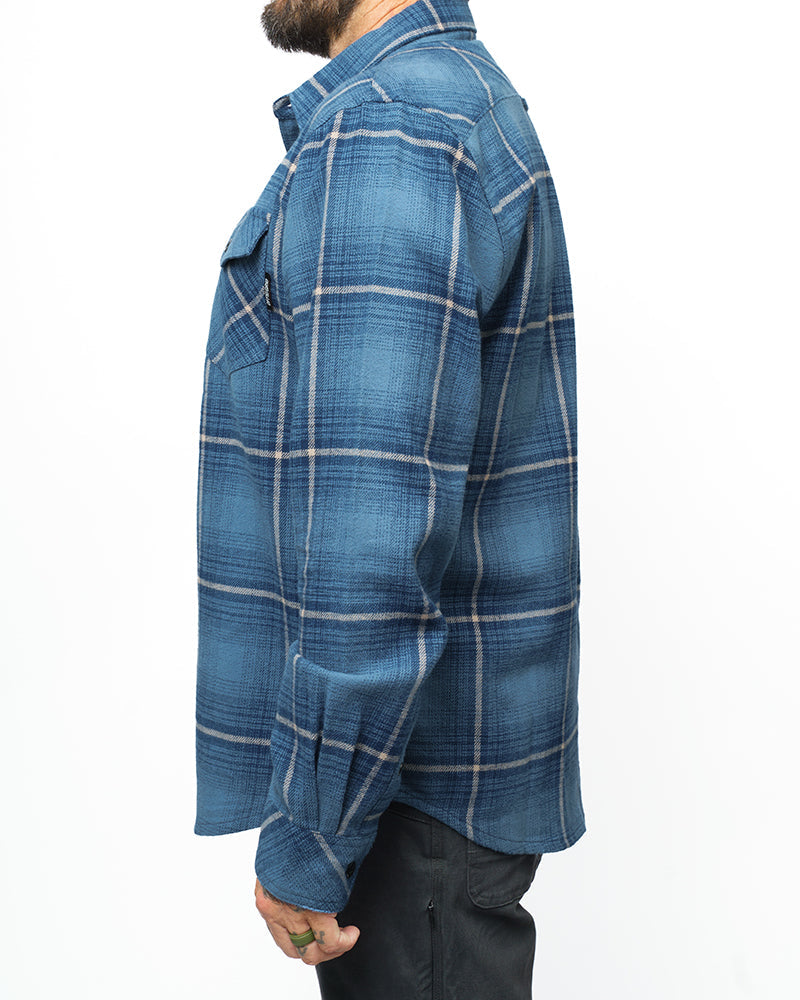 Pale blue Destroyer Flannel shirt by Off The Grid Surplus with a soft, cozy fabric and classic plaid pattern.