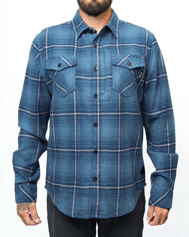 Pale blue Destroyer Flannel shirt by Off The Grid Surplus, soft fabric with button-up front and classic flannel pattern.
