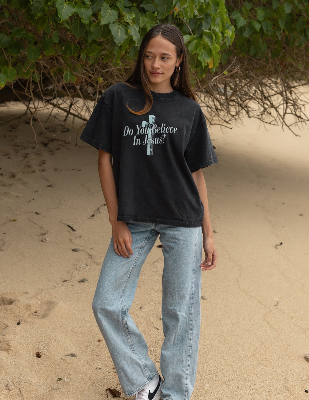 Black heavyweight T-shirt by Elevated Faith featuring a Christian message and bold white text "Do You Believe in Jesus" on the front.