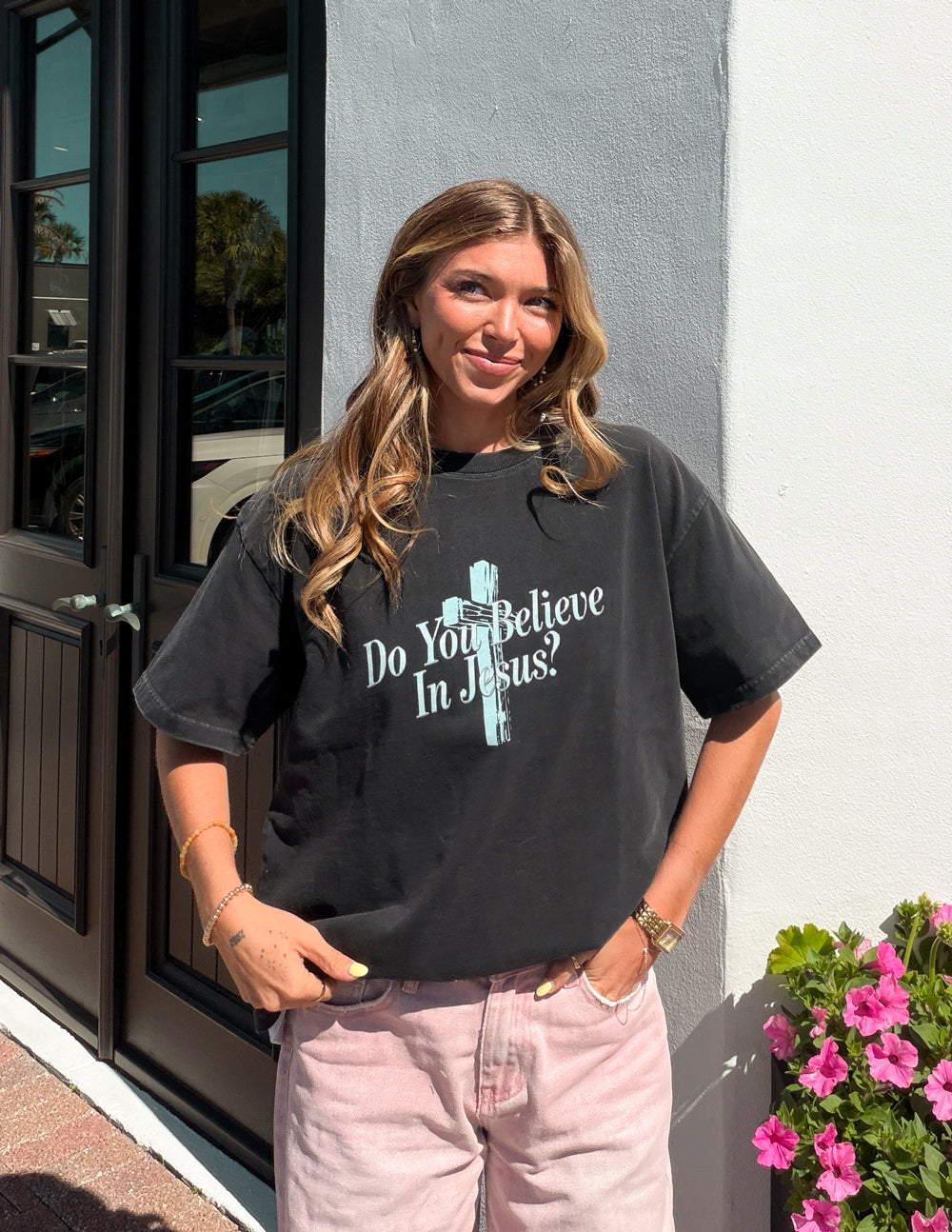 Black heavyweight T-shirt from Elevated Faith featuring a religious design with the text "Do You Believe in Jesus."