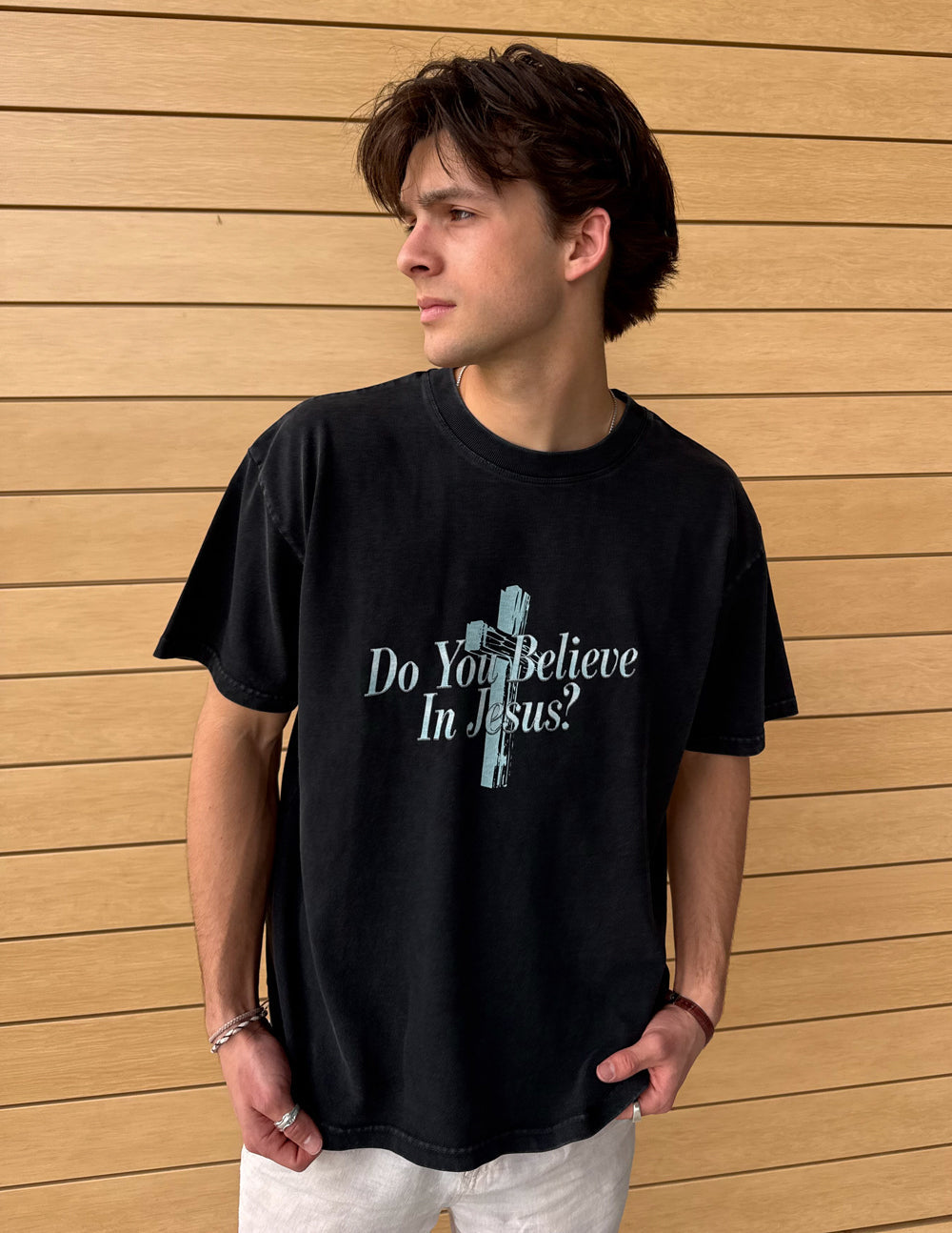 Black heavyweight T-shirt by Elevated Faith with "Do You Believe in Jesus" printed graphic on the front.