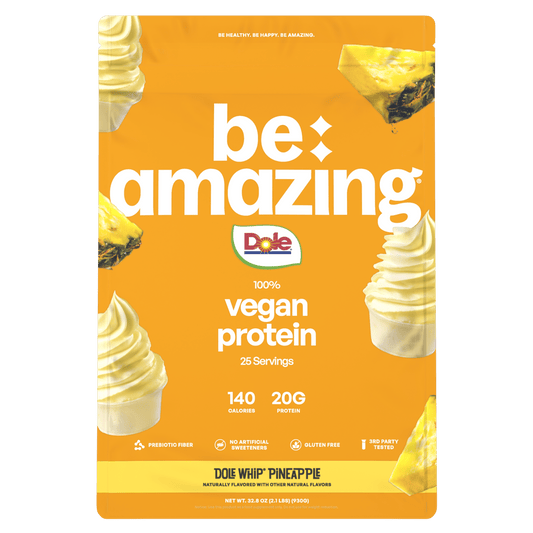 Be Amazing vegan protein powder with pineapple flavor in the Dole Whip style, showing the product container and pineapple imagery.