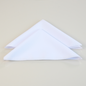 Set of white placemats with gold accents from Maison Charlo, includes table runner, napkins, and napkin rings for elegant table setting.