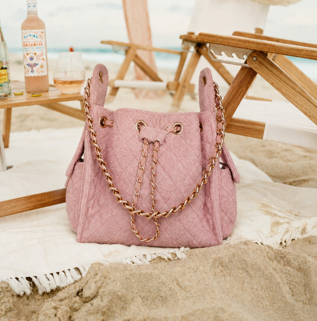 Small Bayshore Bucket in Dusty Rose by BEACH HAUS, showing the stylish, durable canvas bucket with a dusty rose color.