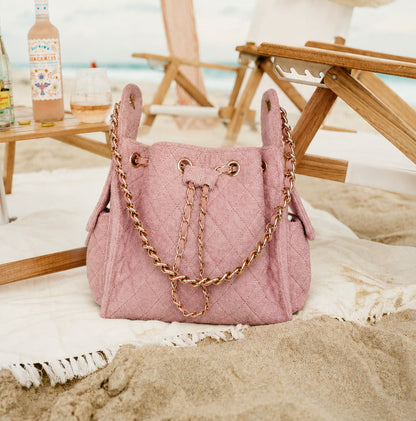 Small Bayshore Bucket in Dusty Rose by BEACH HAUS, showing the stylish, durable canvas bucket with a dusty rose color.