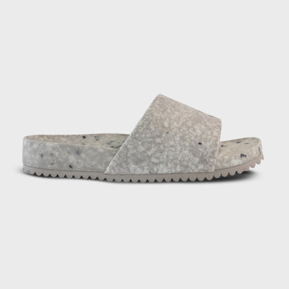 Fleks East Beach Slide in cloudy day style, featuring a single profile view with comfortable slip-on design and casual beachwear look.
