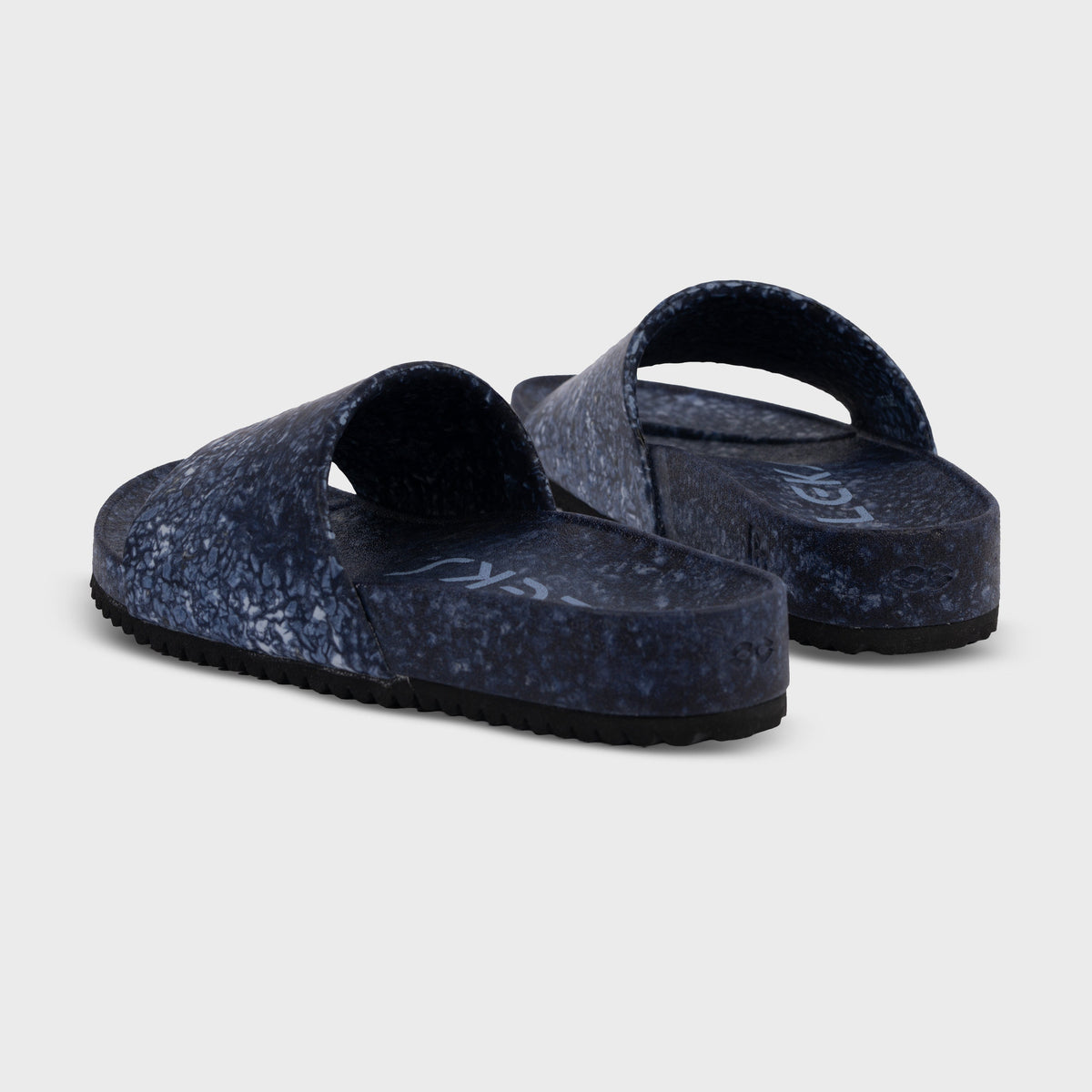 Fleks East Beach Slide in deep blue sea color, featuring casual slip-on design with cushioned sole and open toe for summer wear.