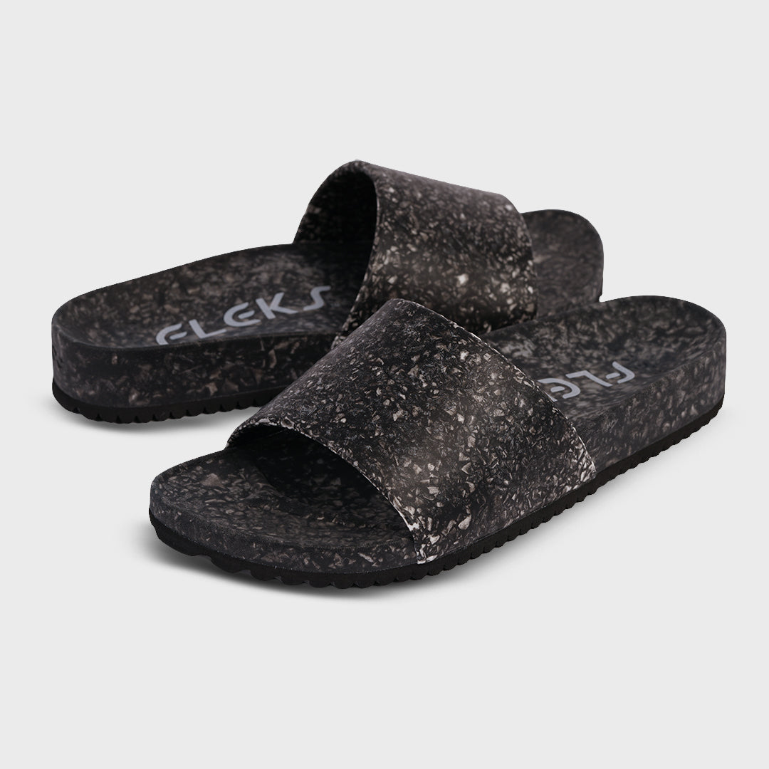 Fleks East Beach Slide in Night color showing casual slip-on sandals with open toes and wide strap, suitable for summer wear.