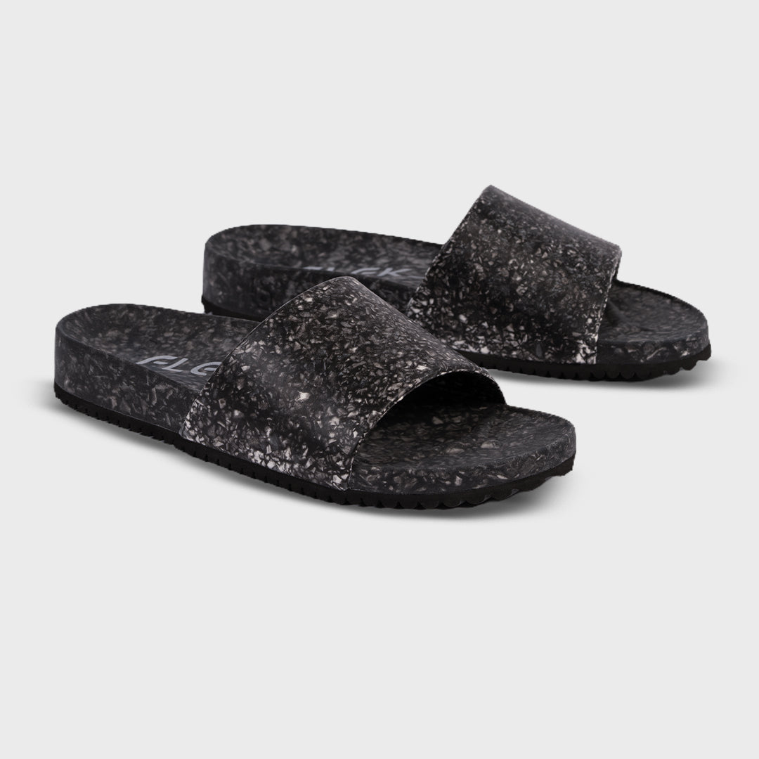 Fleks East Beach Slide in Night color, showcasing the casual slip-on sandal with cushioned strap and textured outsole.