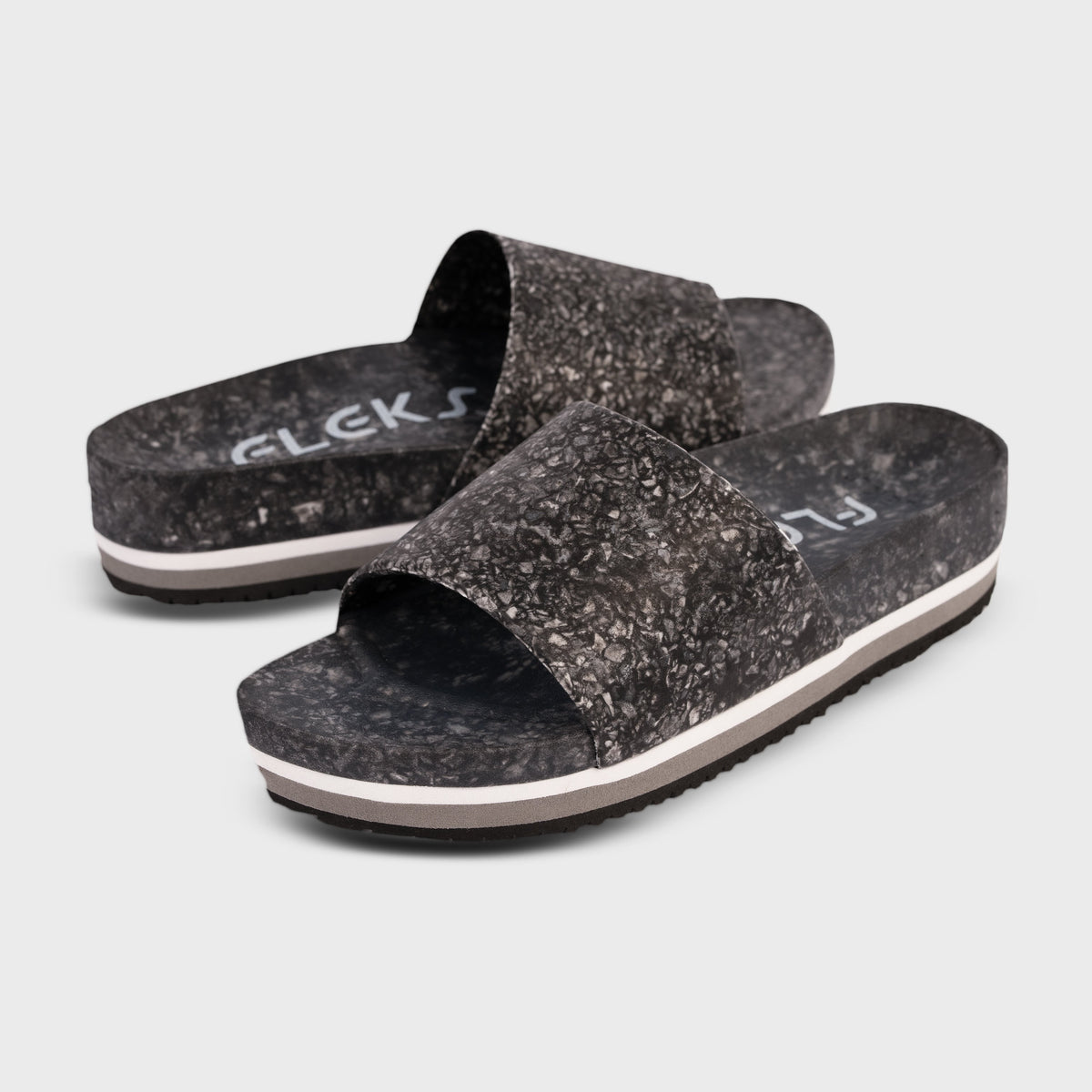 Fleks East Beach Slide Platform in Night color, featuring a sleek slide design with platform and strap details.