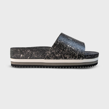 Fleks East Beach Slide Platform in Night color showing single profile with slide design and platform sole.