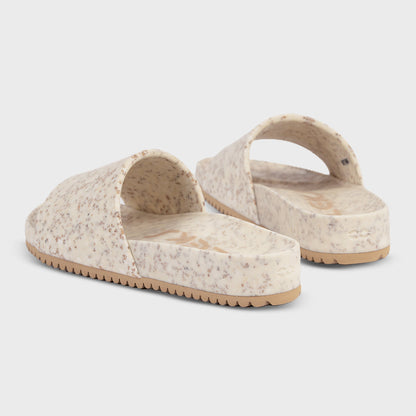 Fleks East Beach Slide in white sand color, showcasing comfortable slip-on footwear with a minimalist design.