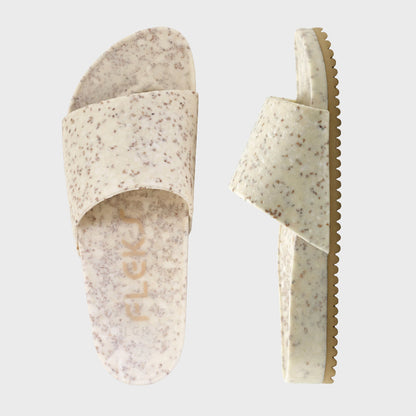 Fleks East Beach Slide in white sand color, featuring casual slip-on design perfect for beach or summer wear.