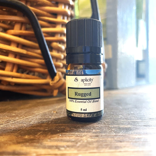 Rugged EO Blend essential oil in 5 ml bottle by Soaplicity, featuring a natural blend of aromatic essential oils.