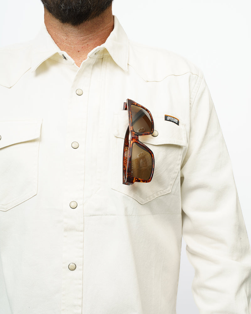 Off The Grid Surplus Earl Denim Shirt in natural color, long sleeve casual shirt with button front and classic denim styling.