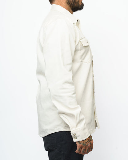 Off The Grid Surplus Earl Denim Shirt in natural long sleeve style, featuring classic denim fabric and button front detail.