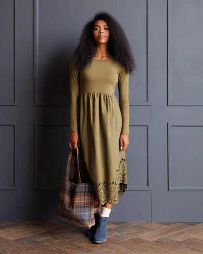 Downeast embroidered hybrid dress with intricate floral embroidery, sleeveless design, and flowing fabric for a stylish look.