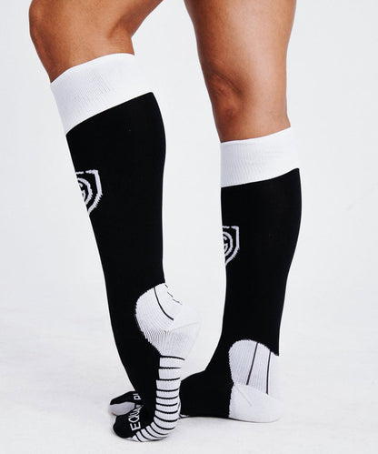Black Equal Play women's over-the-calf soccer socks by Goal Five, ideal for training with sporty, supportive design.