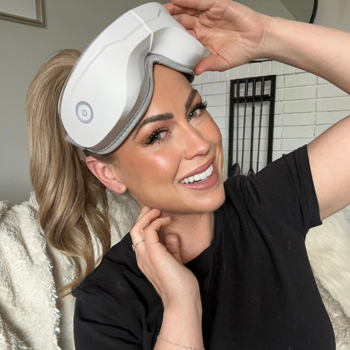 iReliev Relaxable™ Eye Massager with Heat showing a person wearing the massage device around the eyes for relaxation.