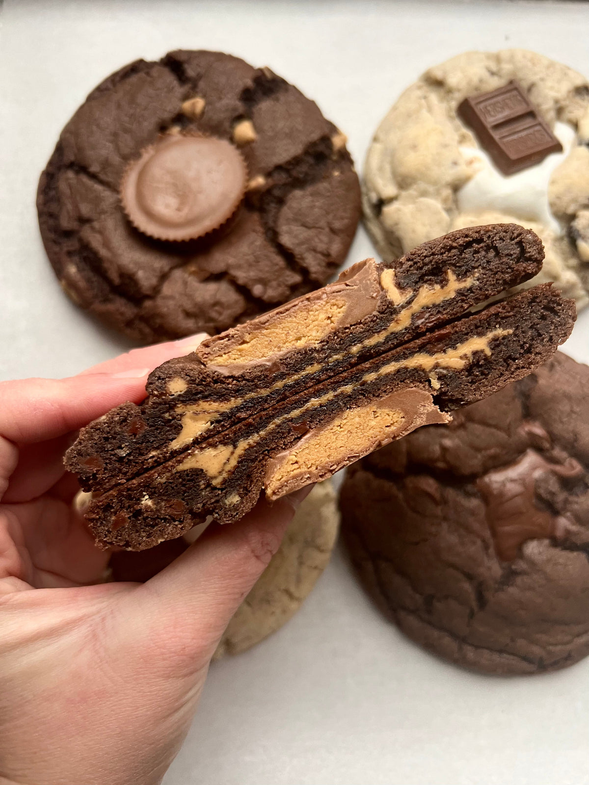 Let's Get Baked Artisan Desserts Reese's Brownie cookies with rich chocolate and peanut butter flavor, freshly baked and delicious.