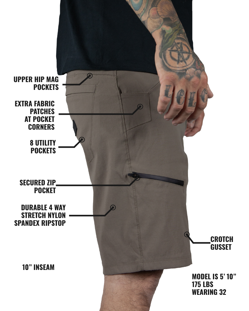 Off The Grid Surplus Deadwood Field Shorts shown in olive green with multiple pockets and sturdy fabric.