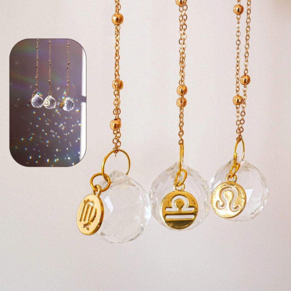 Darn Good Yarn Zodiac Car Suncatcher mirror charm hanging from a car rearview mirror, featuring a celestial zodiac design.