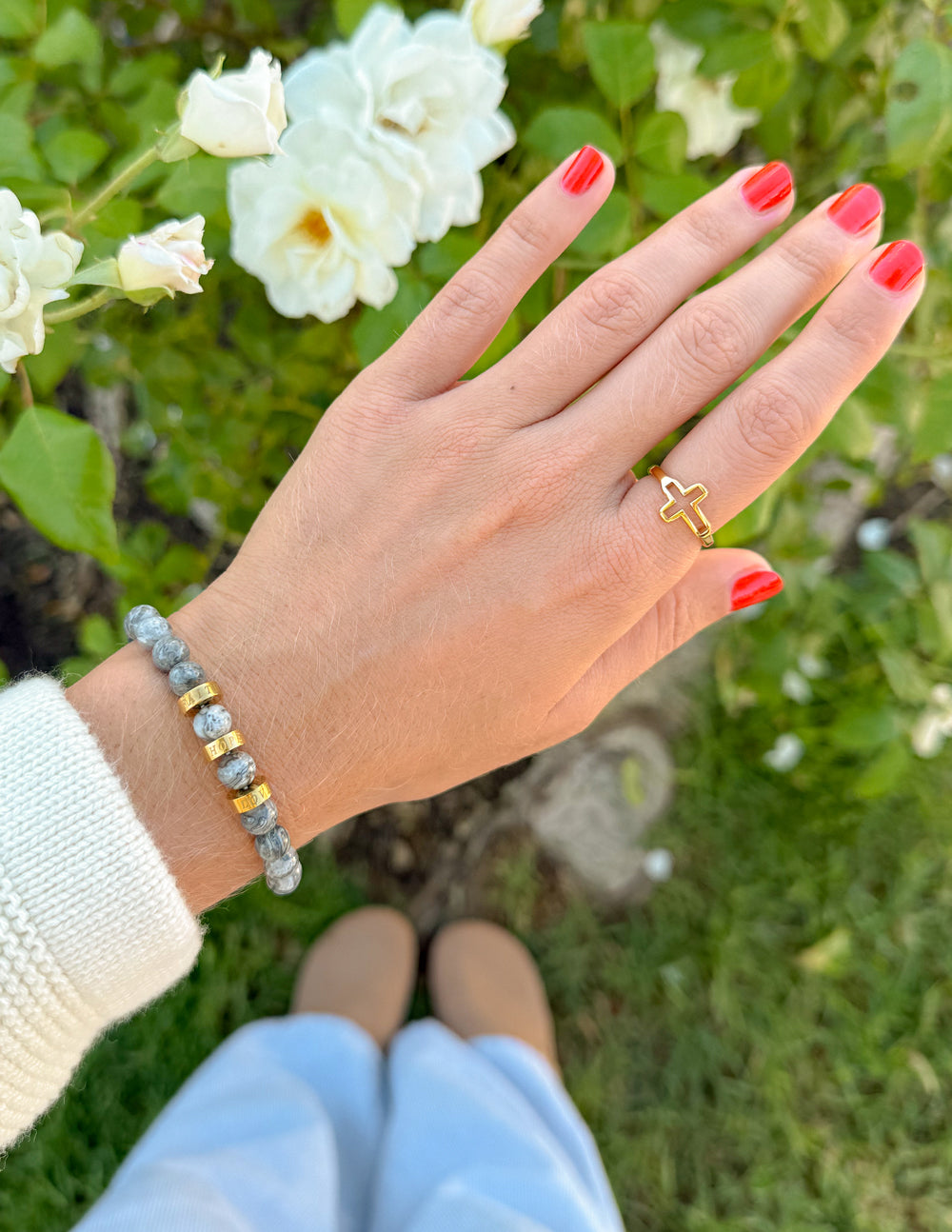 Stone bracelet featuring faith, hope, and love charms from Elevated Faith, designed for spiritual symbolism and stylish wear.