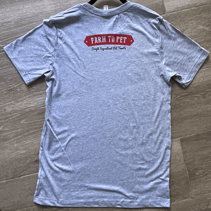 Gray Farm to Pet logo T-shirt showing the back side with a simple Farm to Pet design on the fabric.