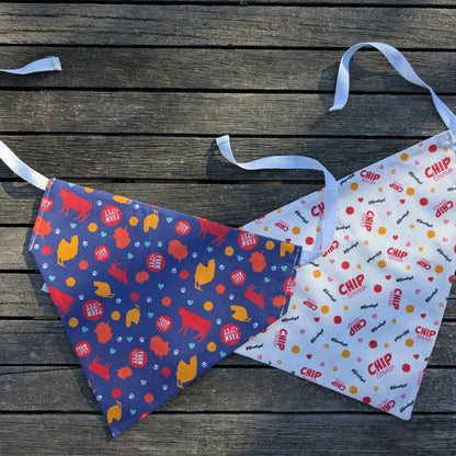 Adjustable string-tie Farm To Pet dog bandana featuring a colorful pattern, suitable for dogs and cats, tied around a pet's neck.