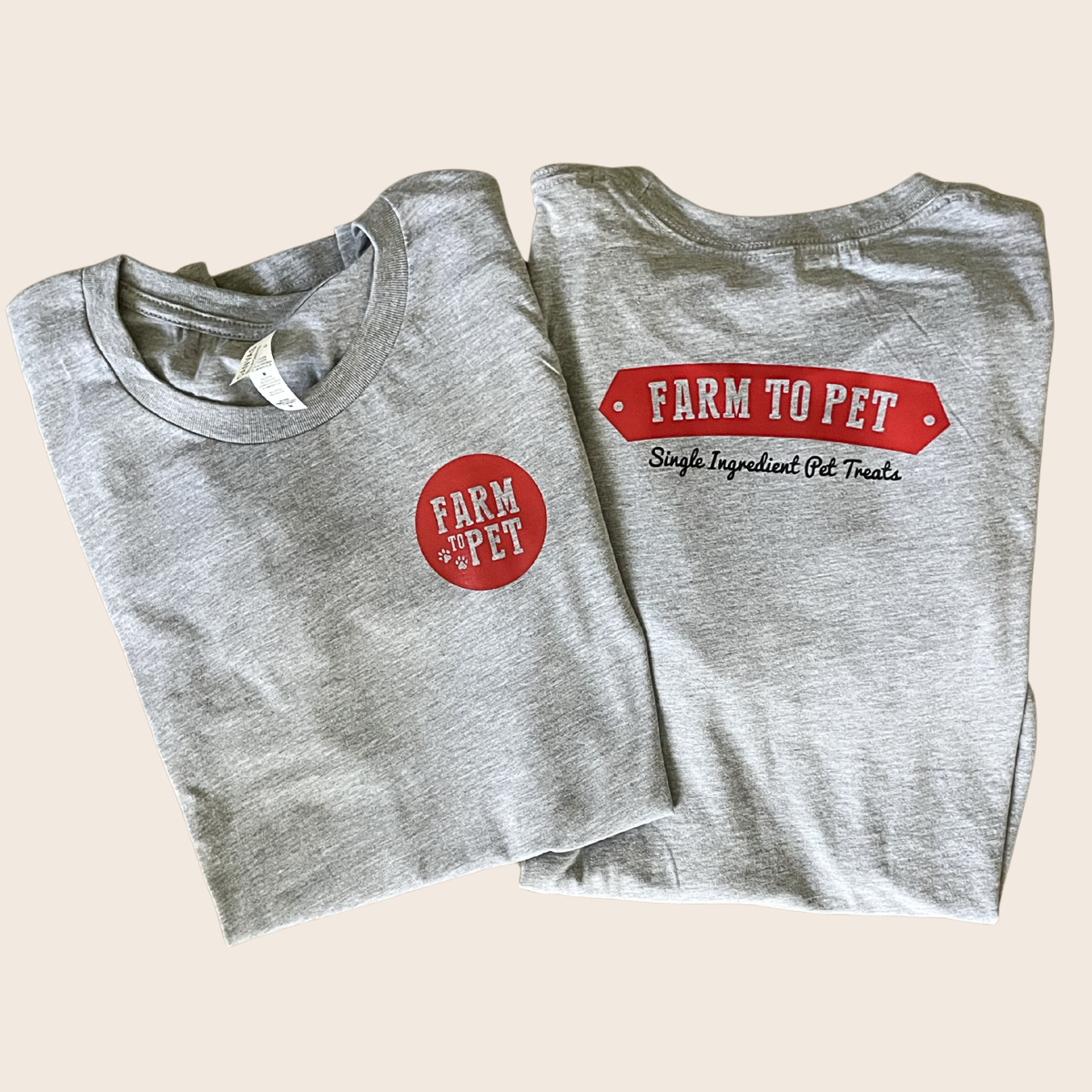 Gray Farm to Pet logo T-shirt featuring a printed farm-inspired design on the front. Comfortable casual apparel for pet lovers.