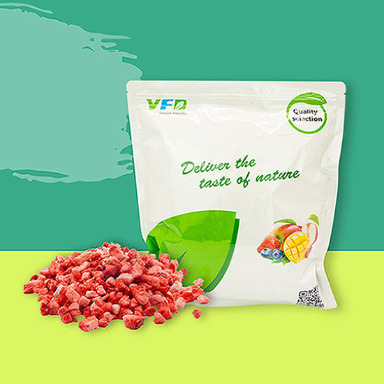 Diced sweetened freeze-dried strawberries by VFD.US, close-up of vibrant red fruit pieces in a clear container.