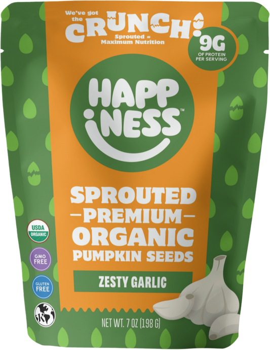 Front view of a jar of Happiness Foods Zesty Garlic seasoning with fresh garlic cloves and herbs visible inside.