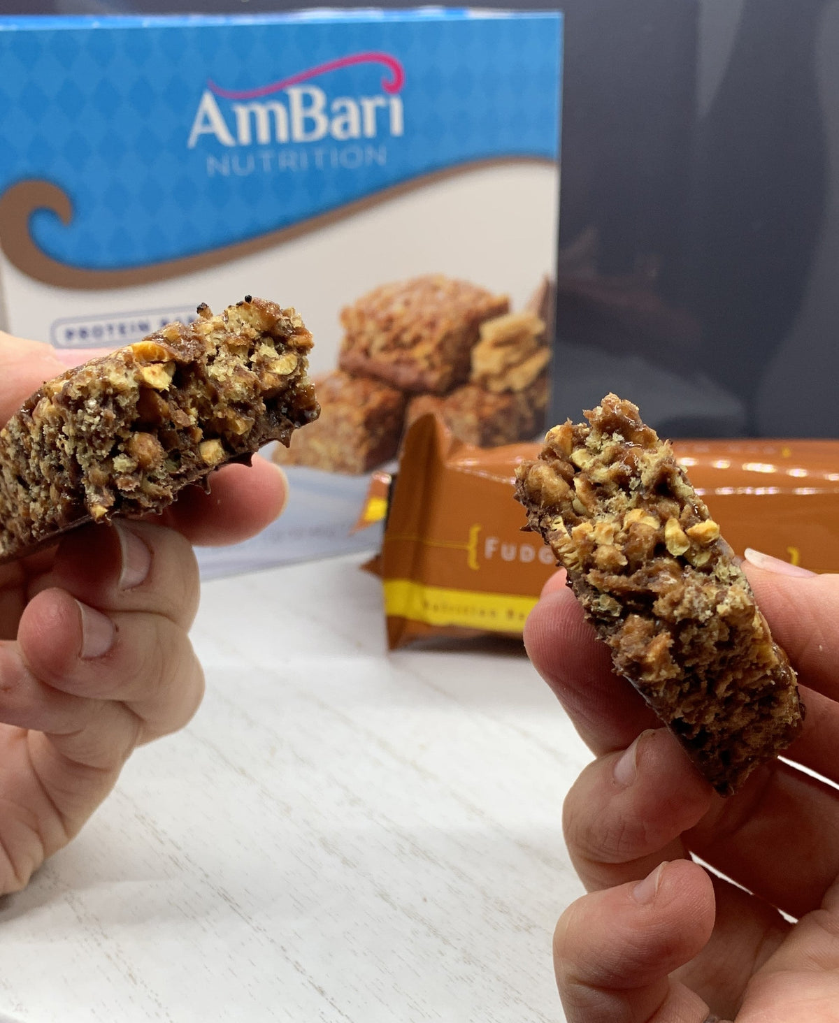 AmBari Nutrition Fudge Graham Bars, protein bars with chocolate and graham cracker layers, displayed on a white background.