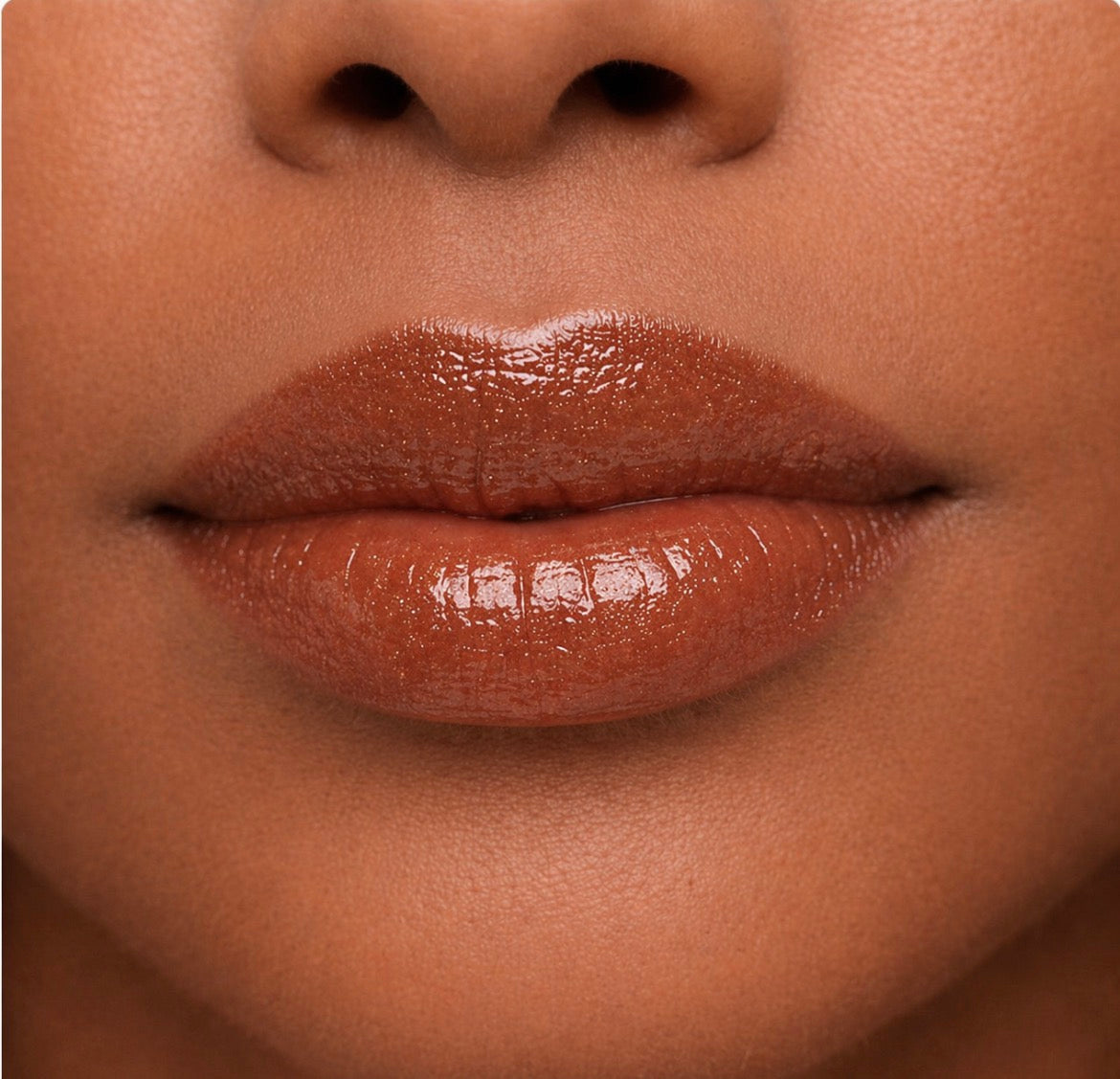 KE Cosmetics Diamond Lip Gloss in a sleek tube, showcasing shimmering, glossy finish for a luxurious bath and beauty look.